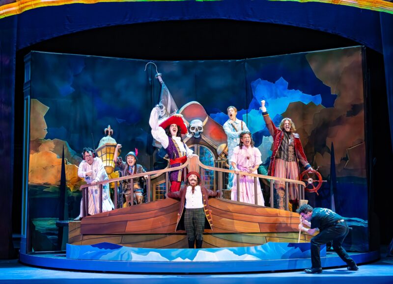 Reggie De Leon, Ixchel Valiente, Josh Grisetti, Cathy Rigby, Nick Apostolina, Regina Fernandez, Trent Mills, and Louis Pardo star in the La Mirada Theatre for the Performing Arts & McCoy Rigby Entertainment production of Peter Pan Goes Wrong at La Mirada Theatre for the Performing Arts. Photo by Jason Niedle/TETHOS